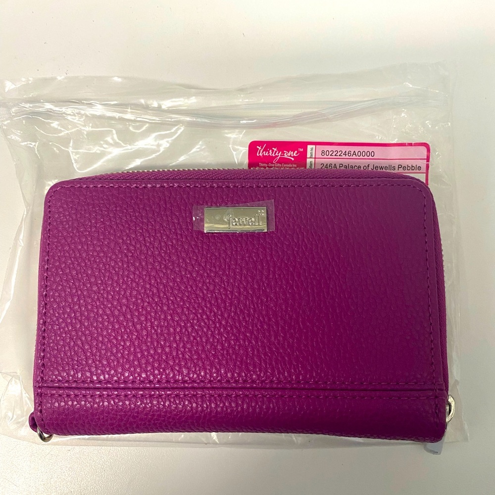 Thirty-one Jewell wallet. New with tag. Great size wallet. Beautiful deep purple